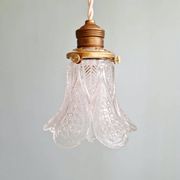 Art Deco trio of pendant lights/table lamps in clear glass, 1920s-30s.