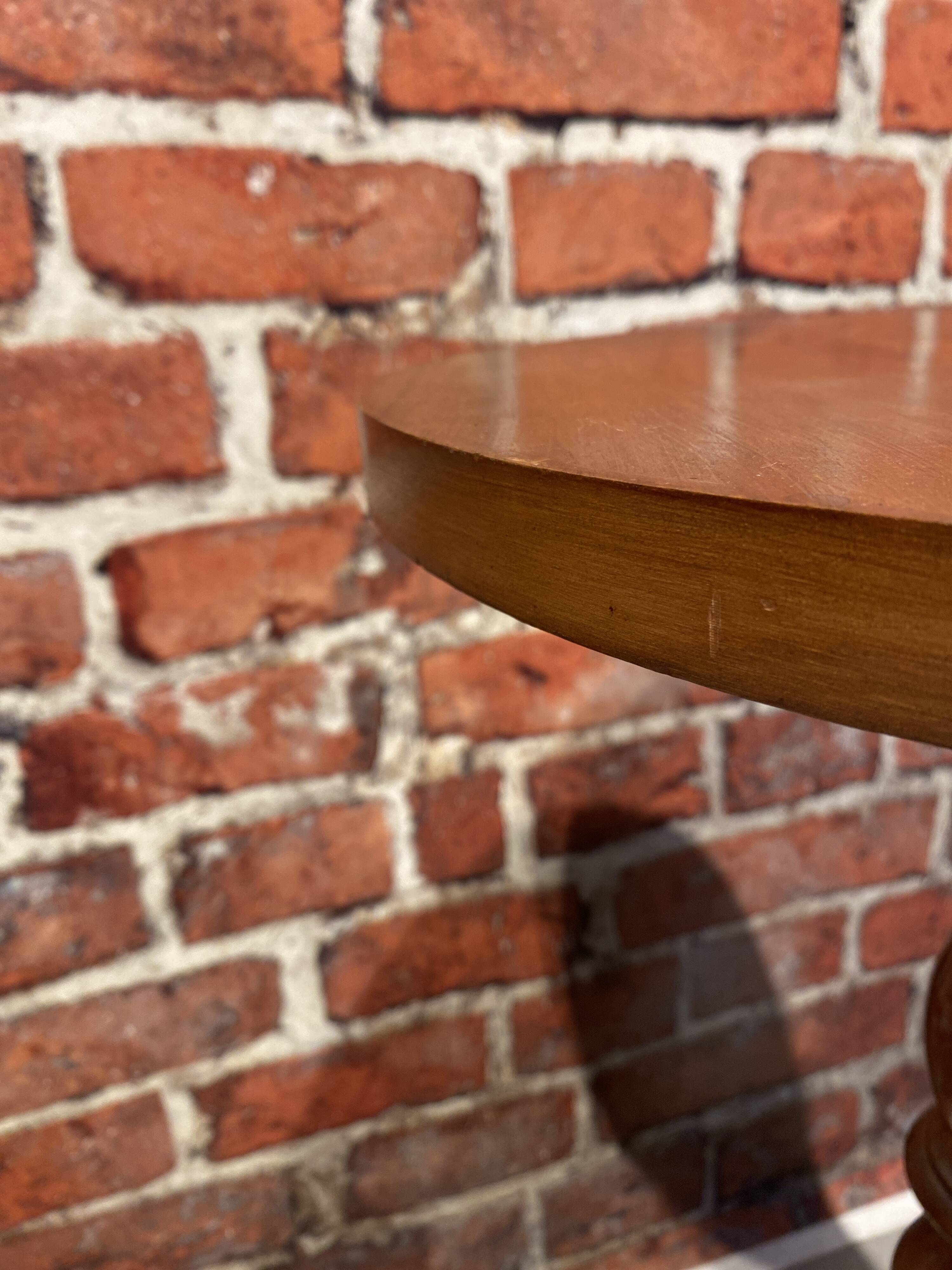 Wooden pedestal table