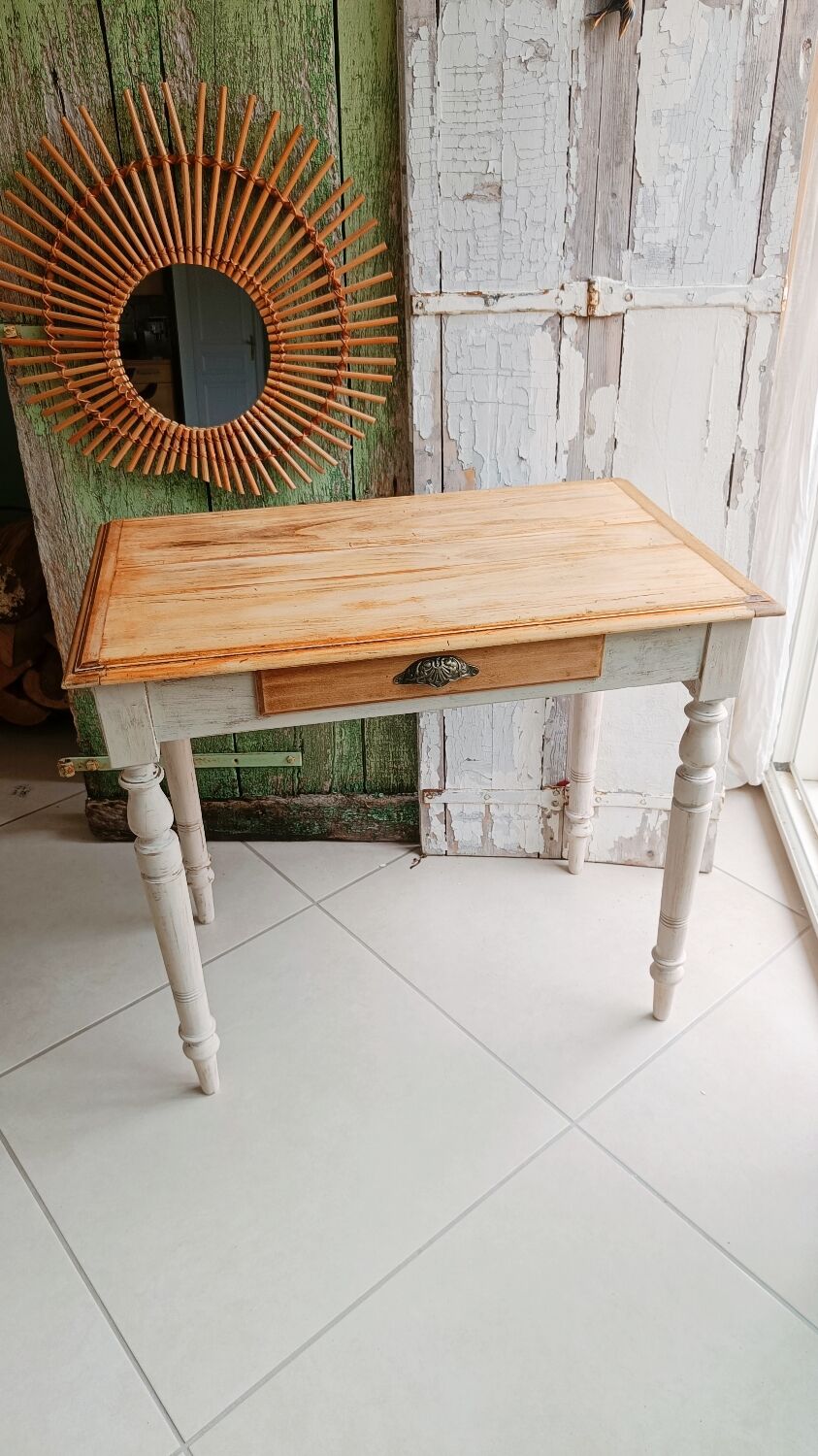 Antique wooden desk with a patinated base