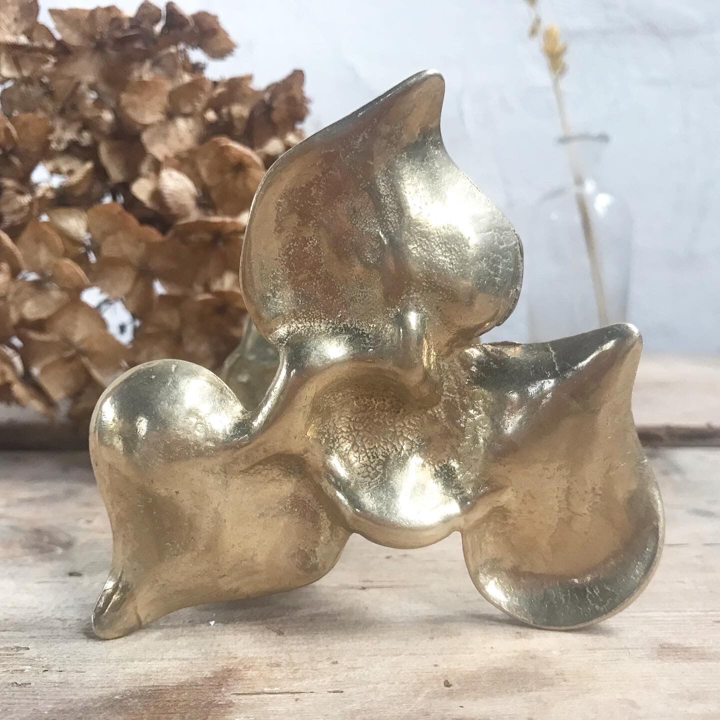 Brass flower candle holder