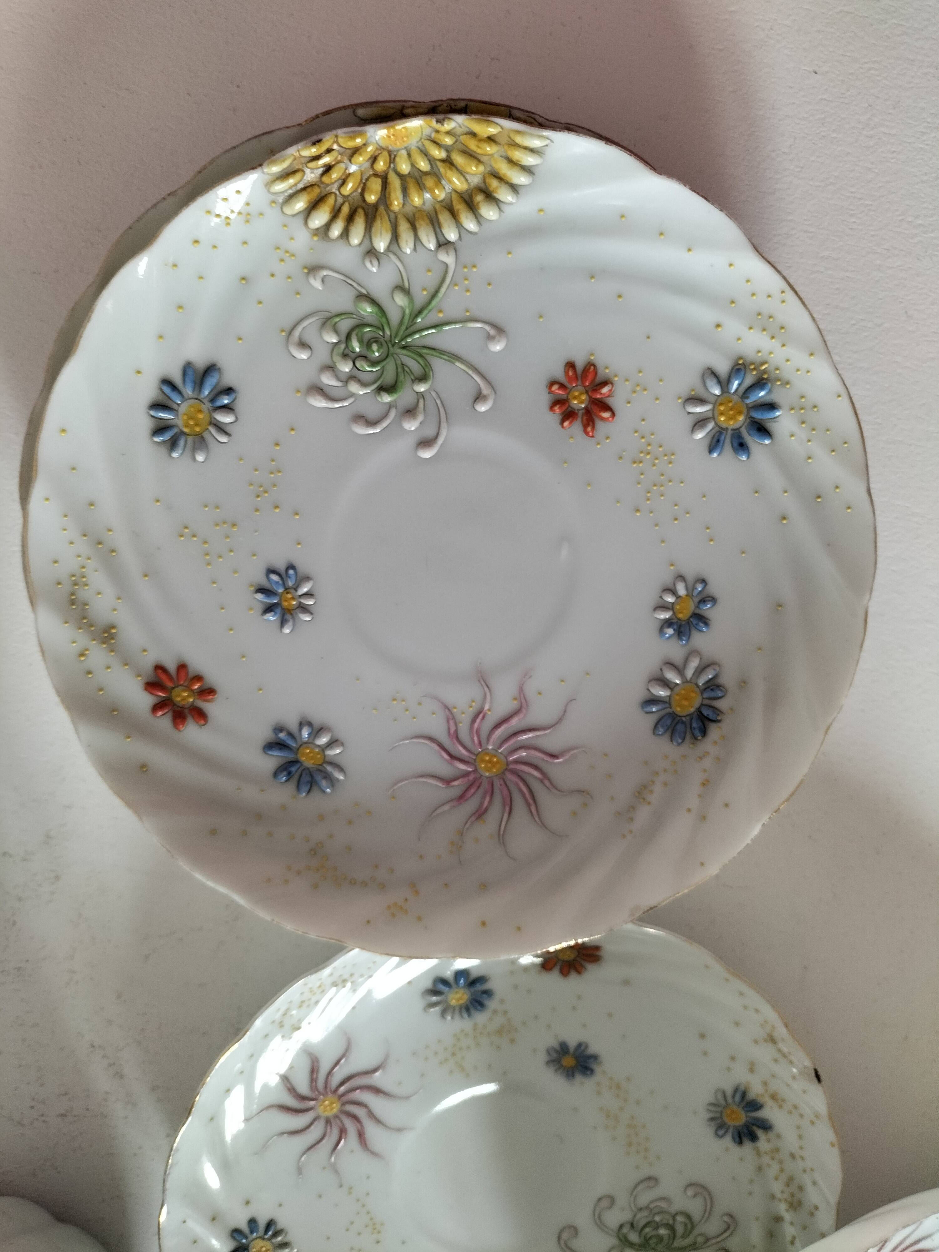 coffee pot, cup and saucers