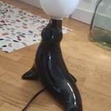 Vintage black sea lion lamp