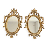 Pair of gilded rococo style mirrors, 1970s