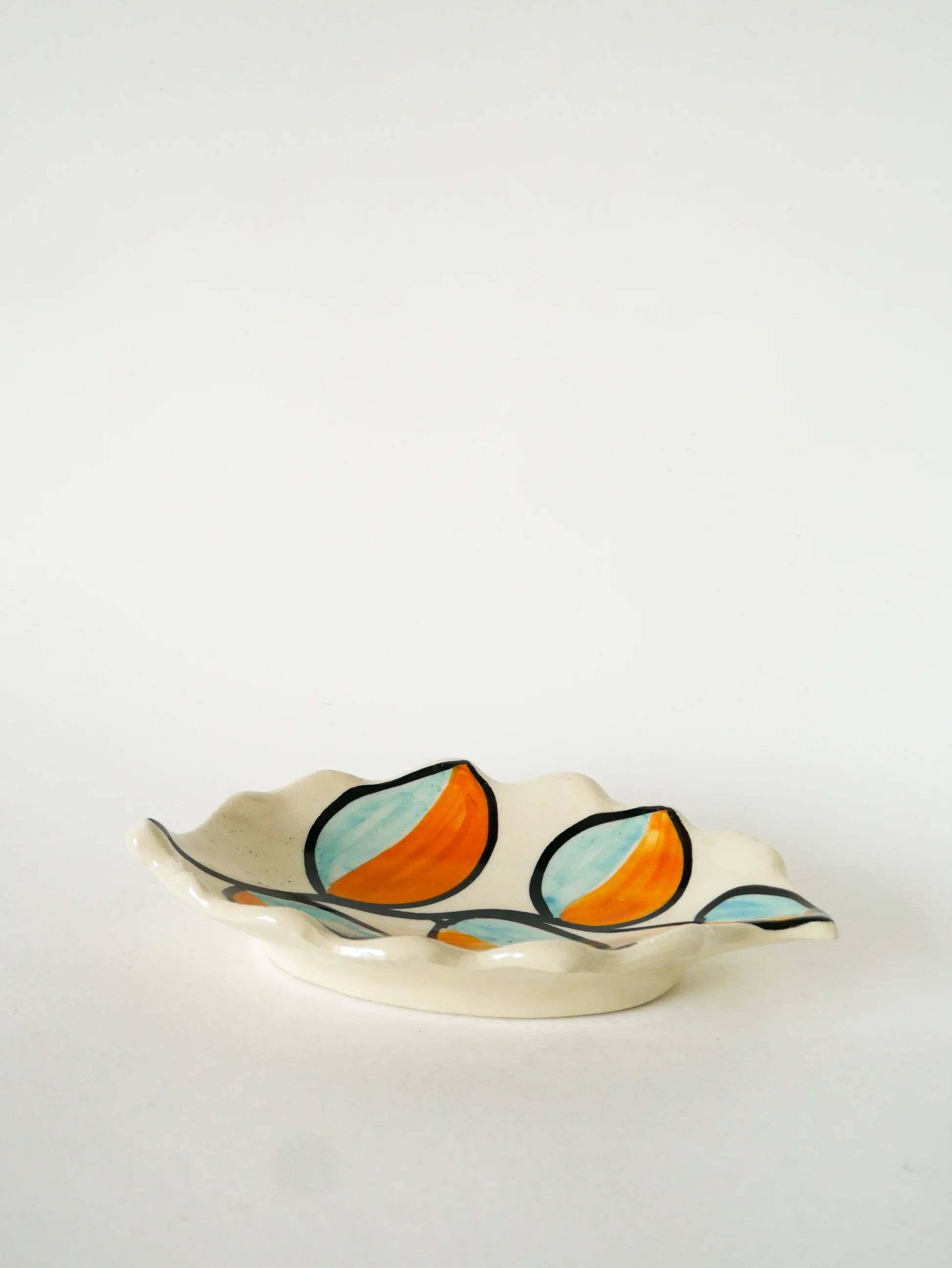 Ceramic catchall, leaf shape, orange and blue, psychedelic, 1970.