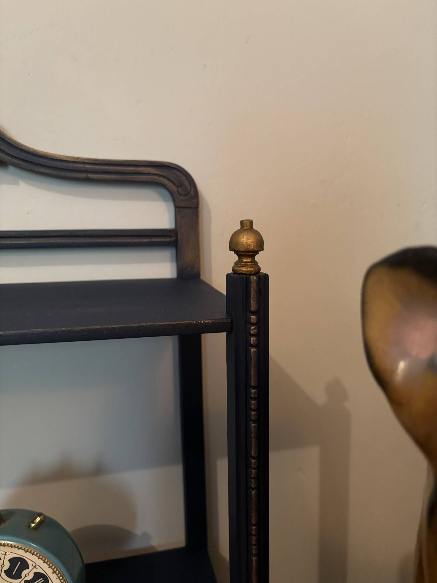 Small vintage shelf reimagined in midnight blue & gold, curiosity cabinet.