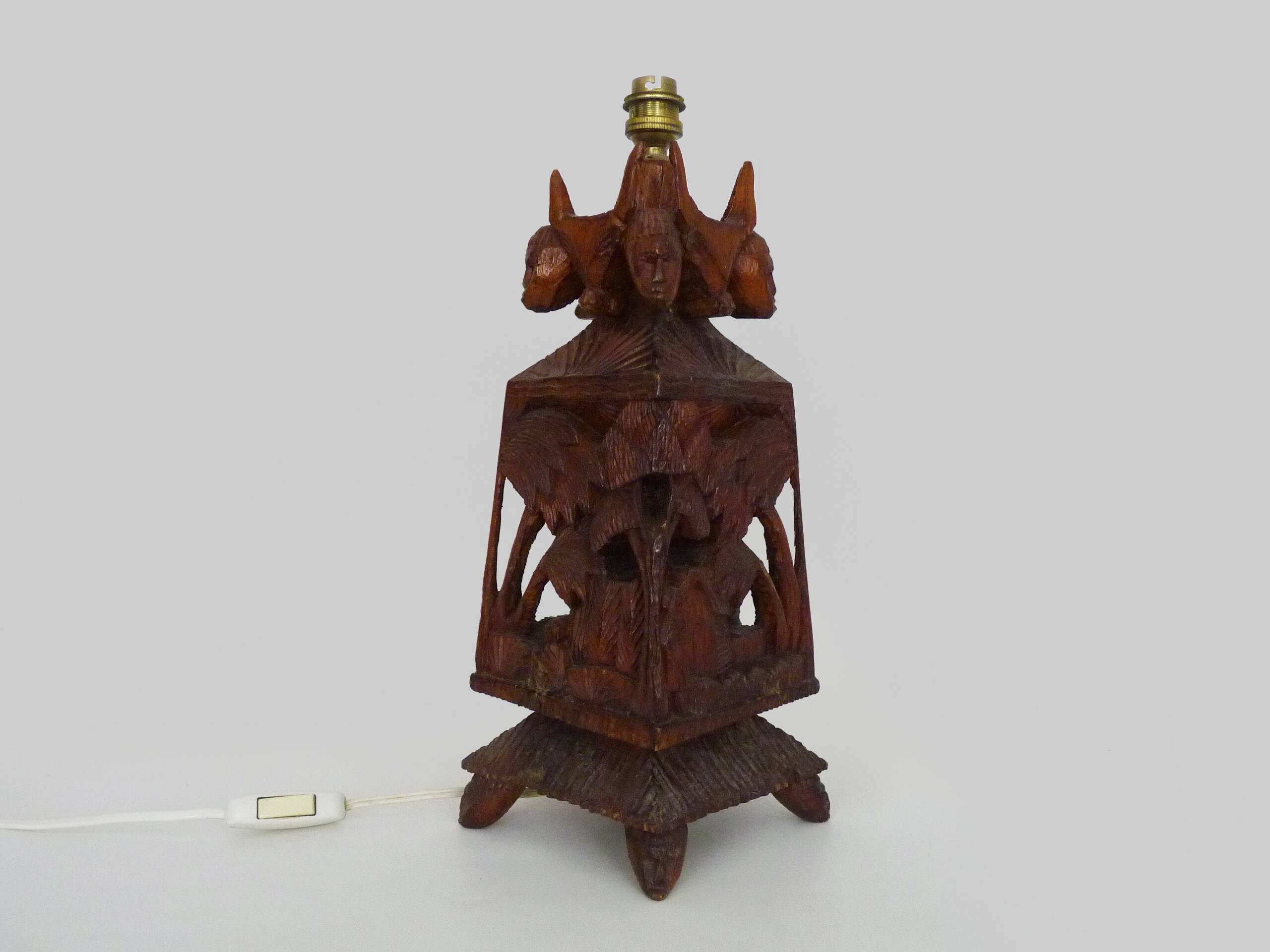 Old large lamp from Malagasy School and Tananarive in carved wood. Art Deco.