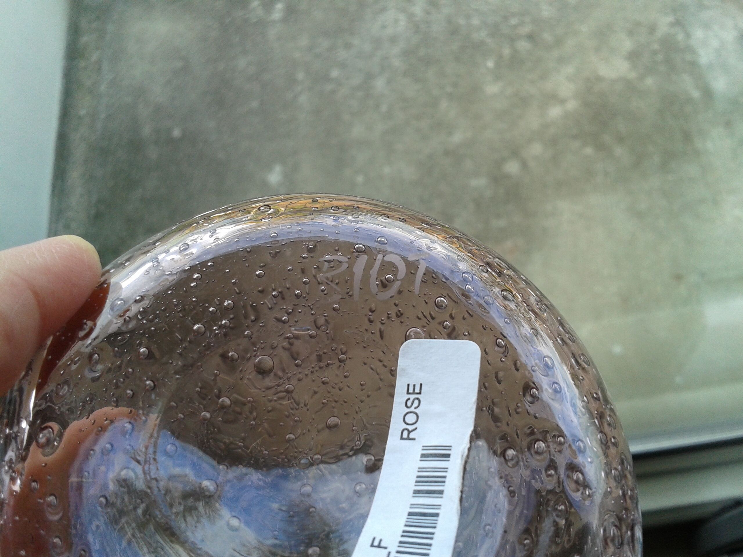 A bolted glass carafe