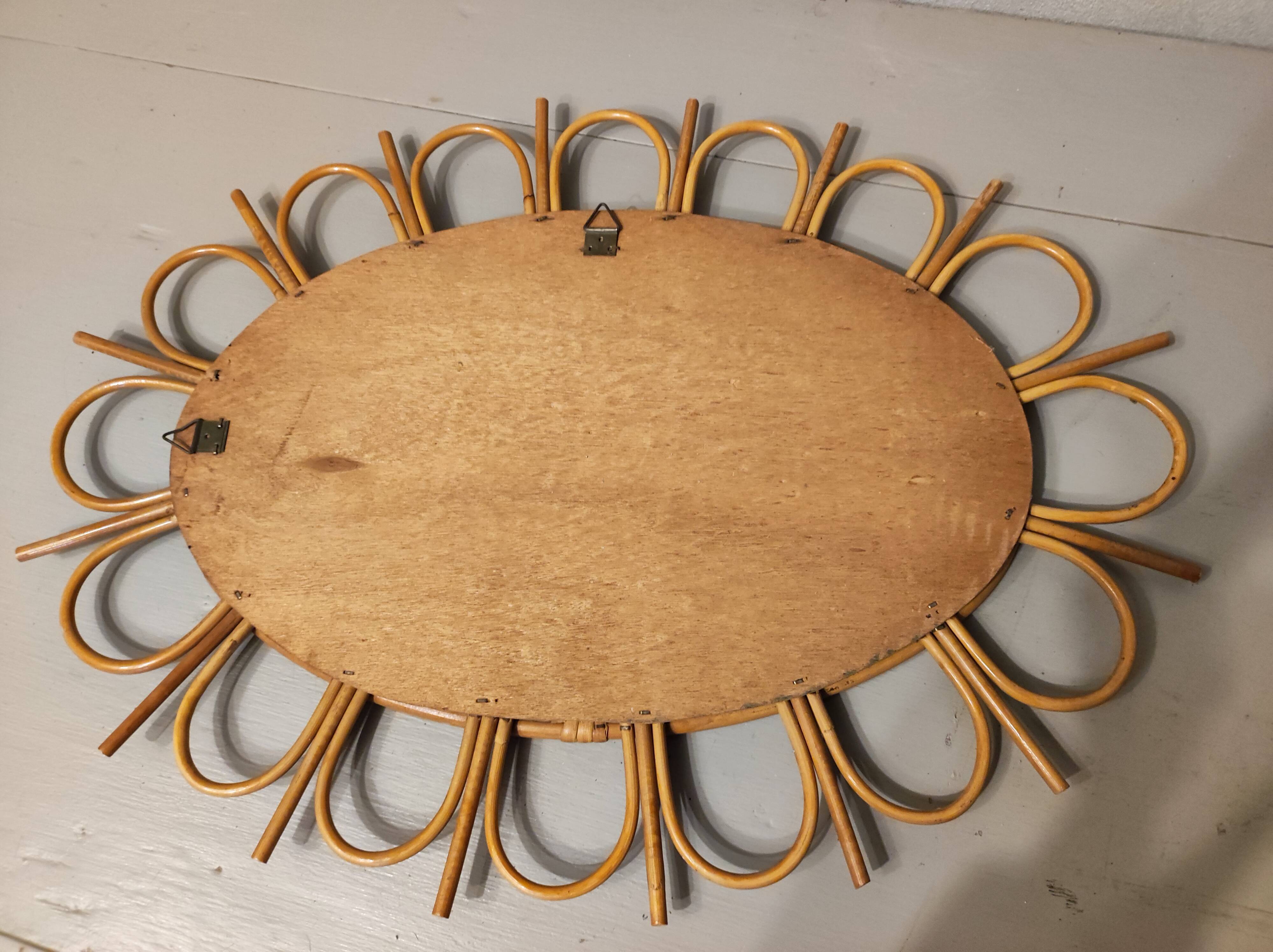Oval rattan mirror, 1960