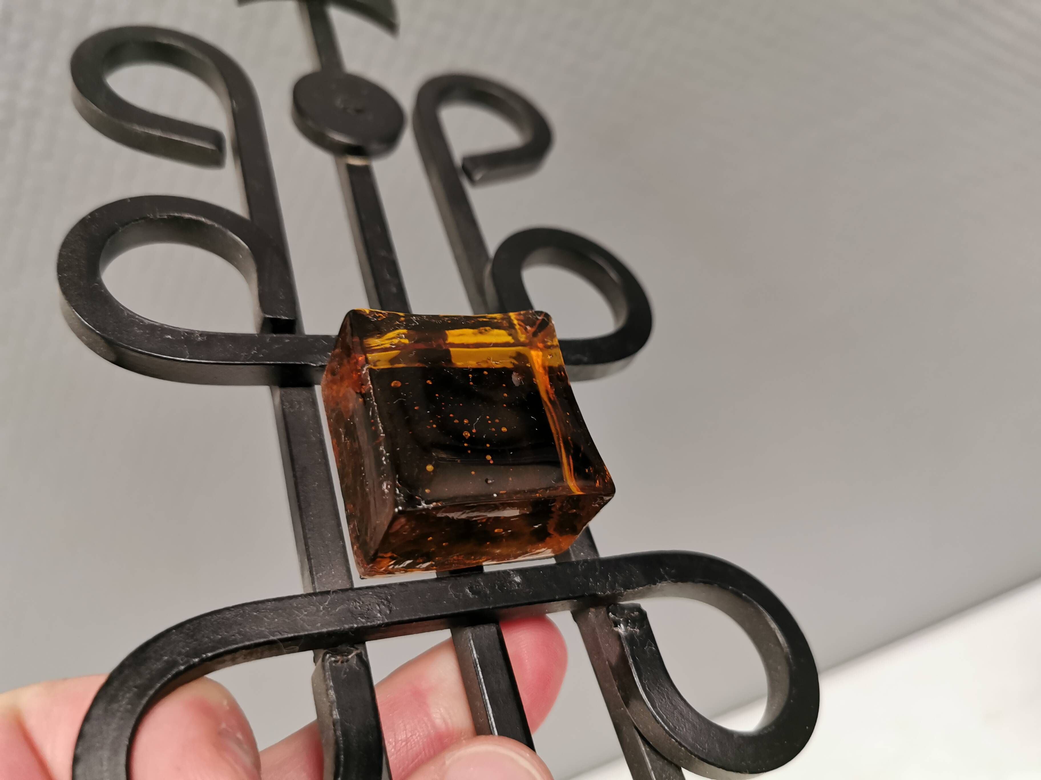 Vintage wall candle holder, wrought iron and  pressed orange/amber glass