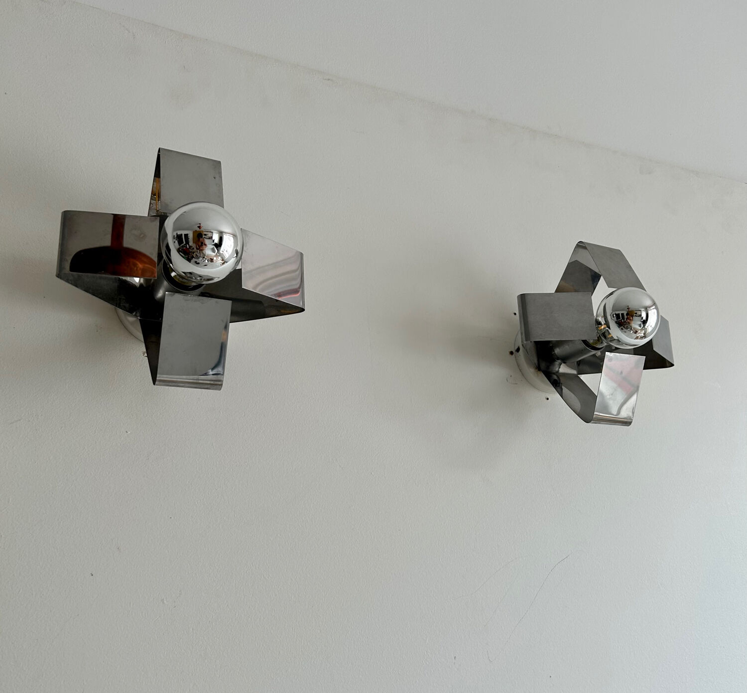 Pair of wall lamps in chromed metal France 1970