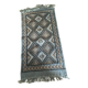 Handmade turquoise and beige wool rug, new.