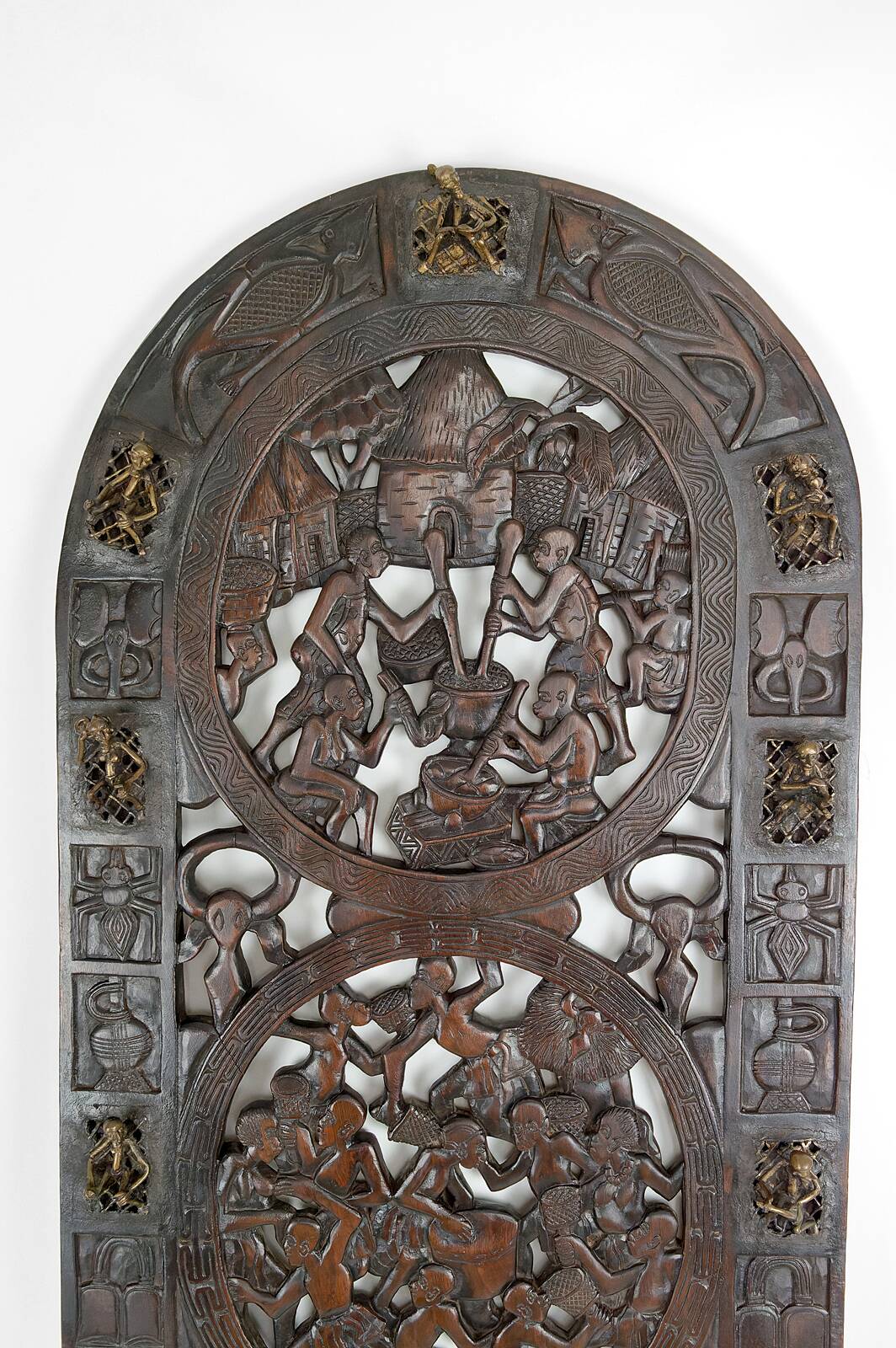 African door in carved wood and bronze of village chief Baboun, Cameroon, early 20th century