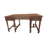 Flat walnut desk with eight feet turned