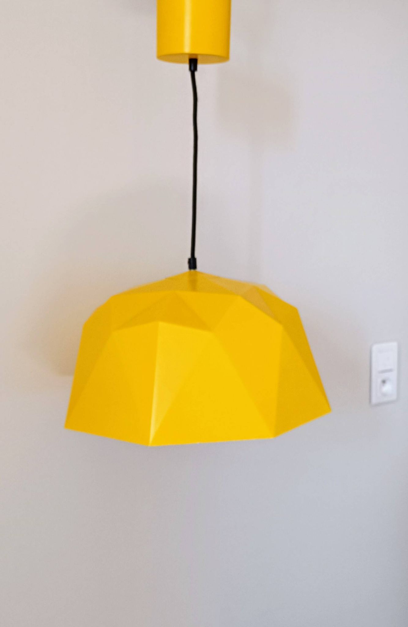 Vintage Bakelite origami-shaped yellow pendant light