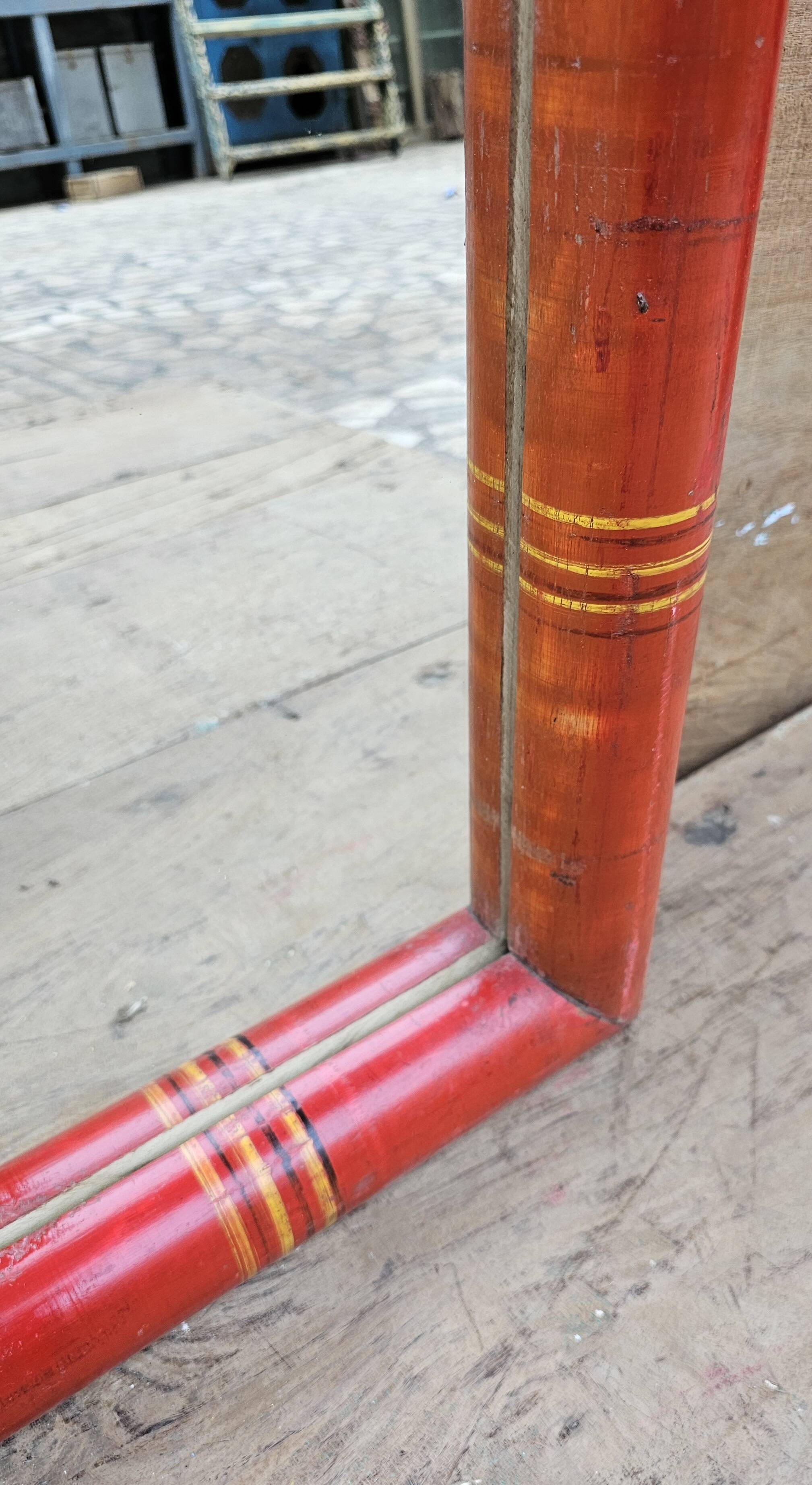Antique mirror in Burmese teak.