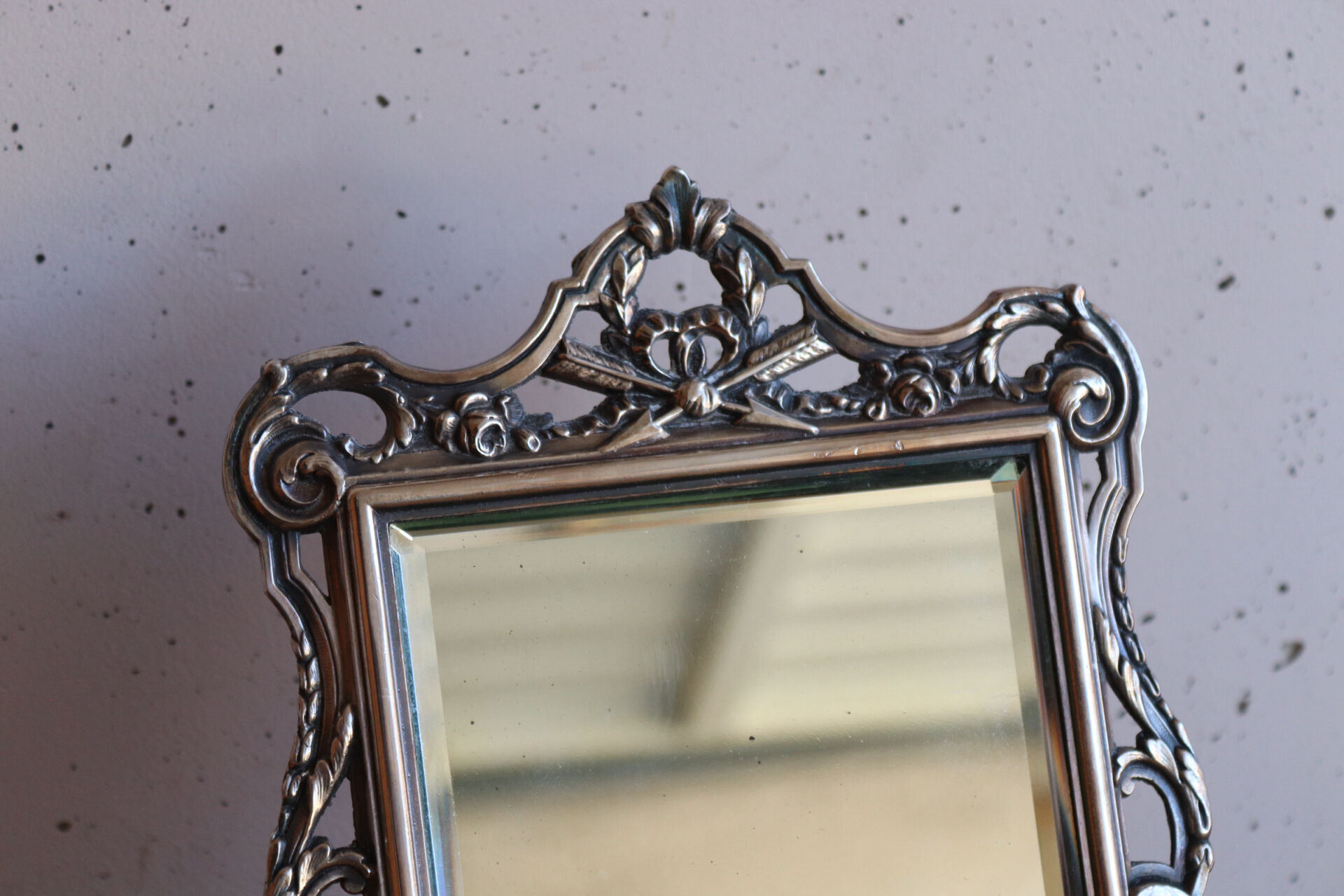 Small antique table mirror in Louis XVI style, silver-plated metal.