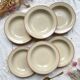 6 Deep plates in speckled beige stoneware, Tulowice style, Poland 1970