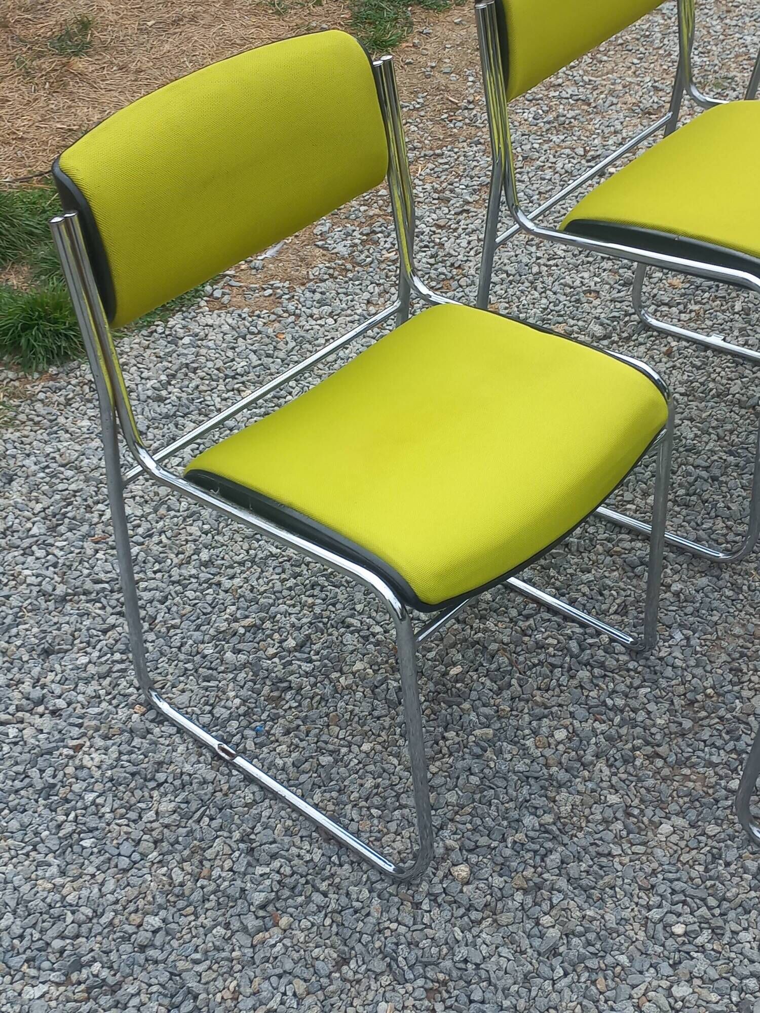 Set of 6 designer chairs with wooden seats and backs, chrome legs.