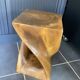 Stool no. 1 in solid raw walnut wood, carved from the mass, 1970.
