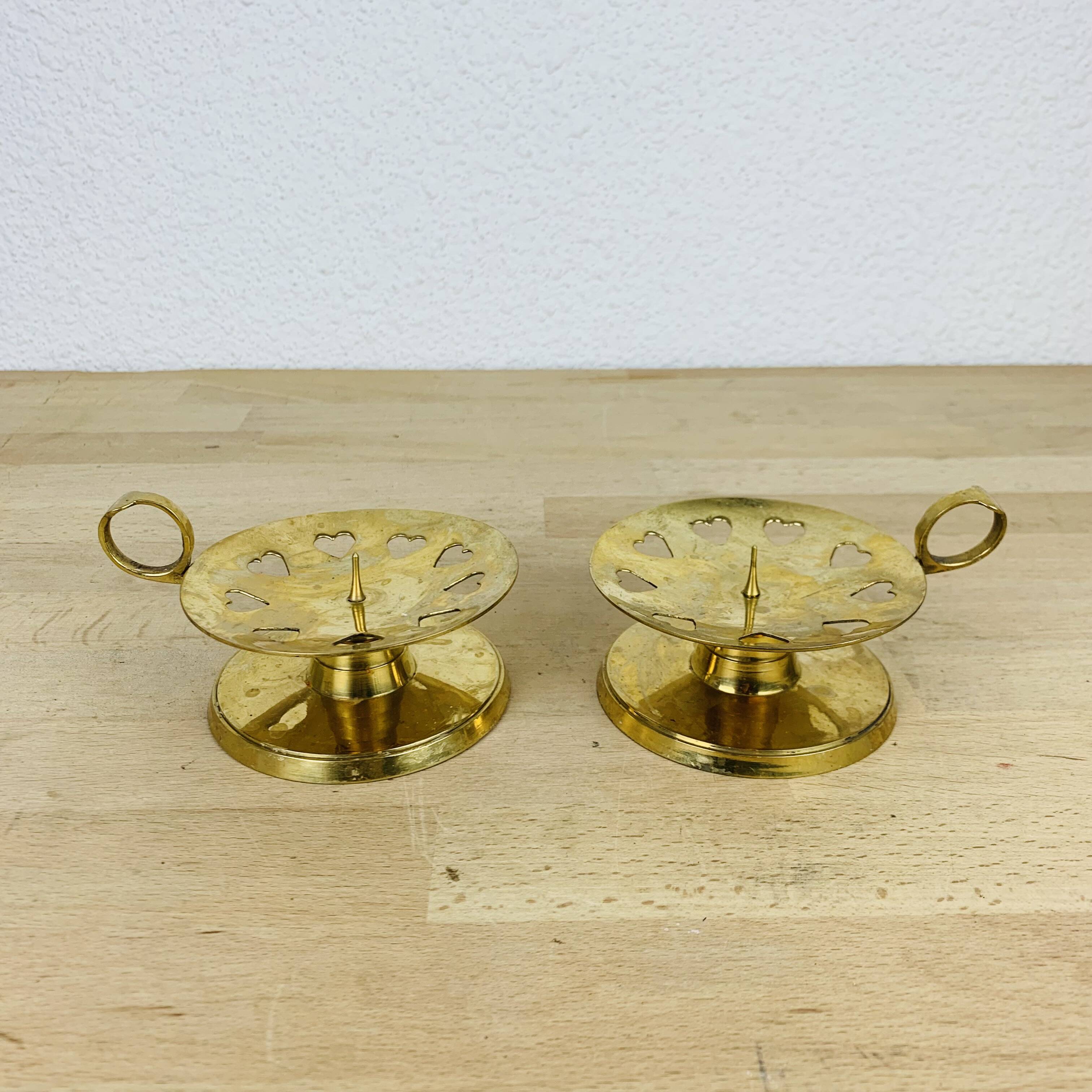 Pair of gilded brass cellar rat candlesticks