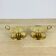 Pair of gilded brass cellar rat candlesticks