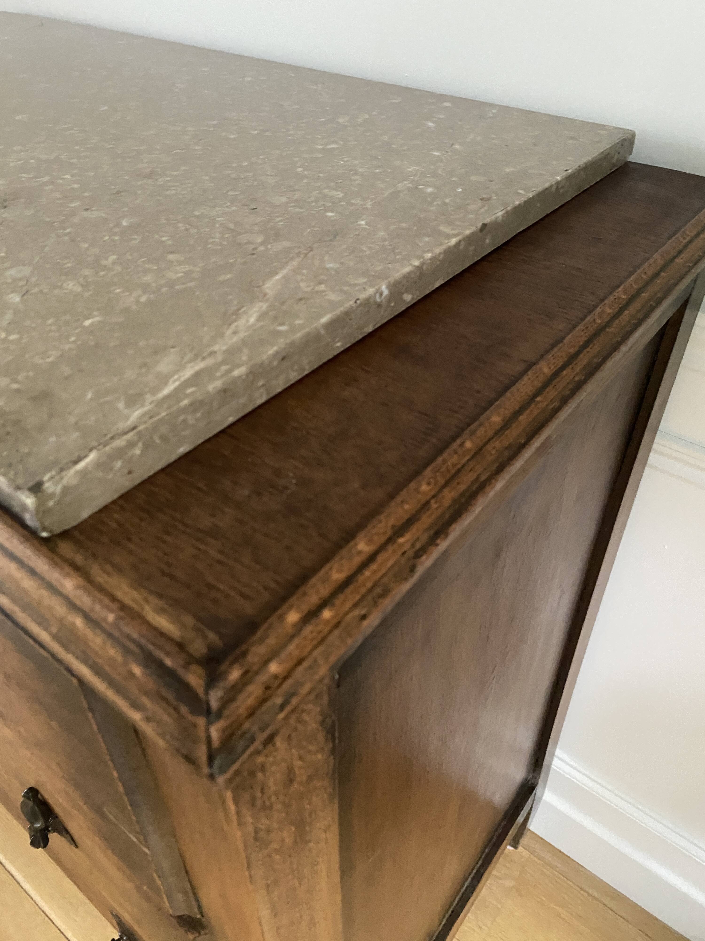 Vintage wooden chest of drawers with three drawers and brown marble top