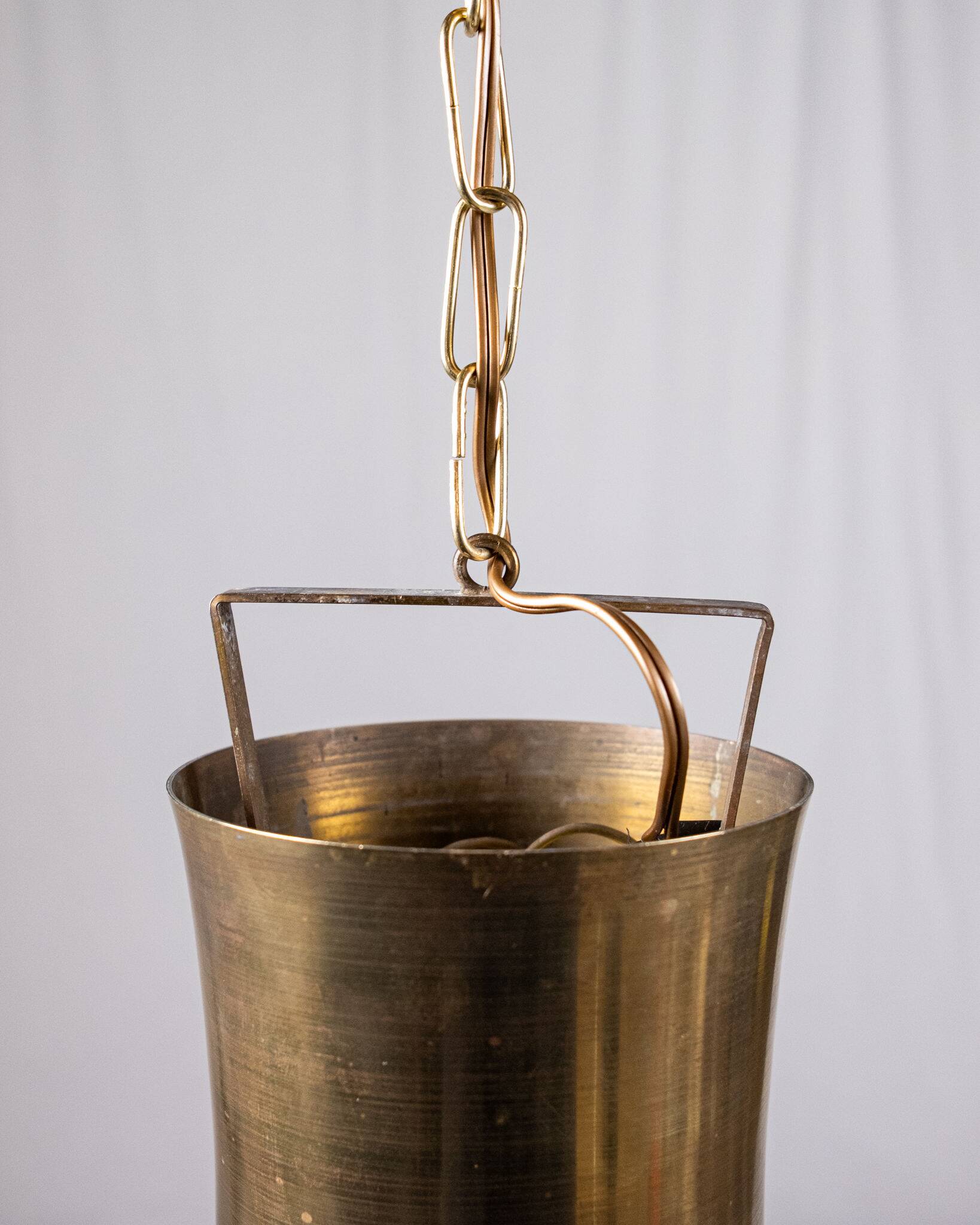 Pair of brass pendants, hourglass shape, 1960s