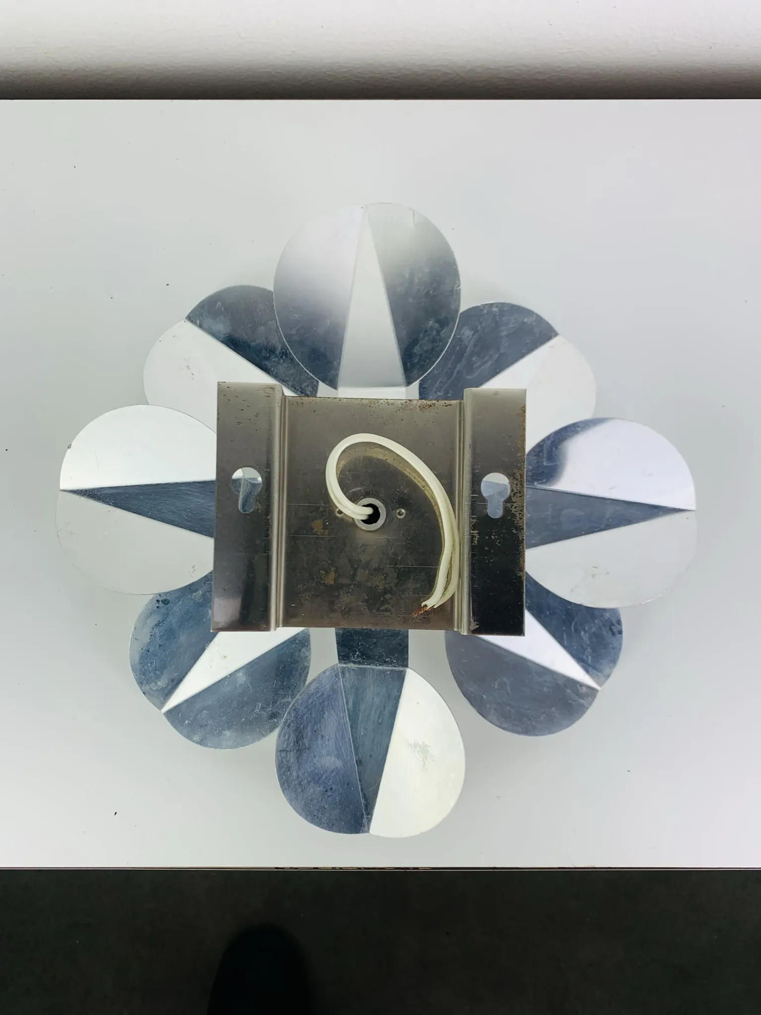 Space Age chrome flower wall light from the 1960s.