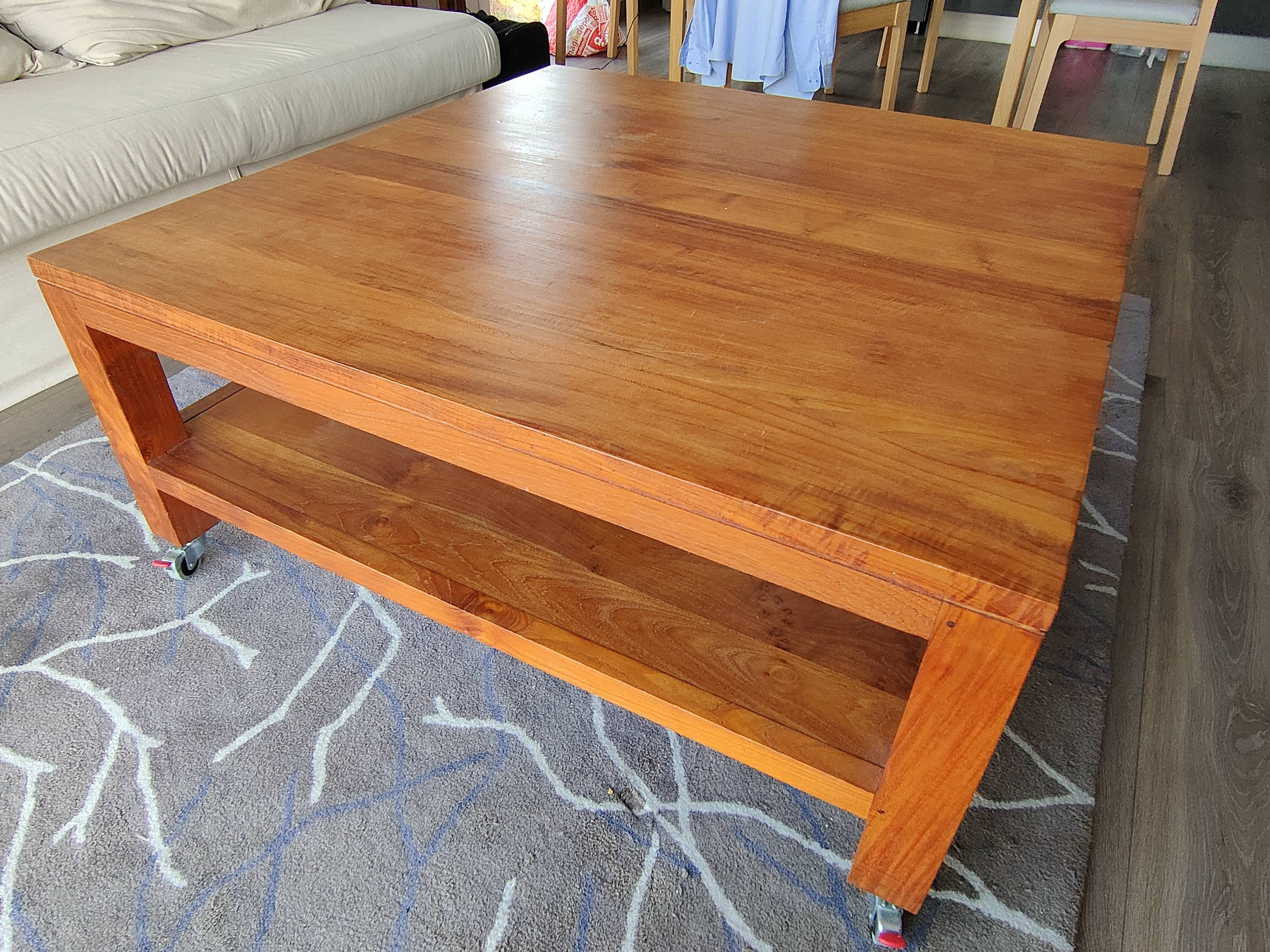 Coffee table for the living room in solid teak.