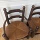 Paire de fauteuils en bois et paille  Charles Dudouyt 