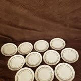11 porcelain plates 12 sides bordered small flowers