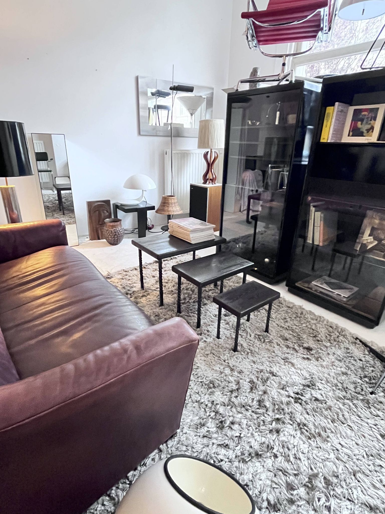 Brutalist nesting table in ebonized oak and wrought iron
