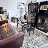 Brutalist nesting table in ebonized oak and wrought iron