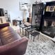 Brutalist nesting table in ebonized oak and wrought iron