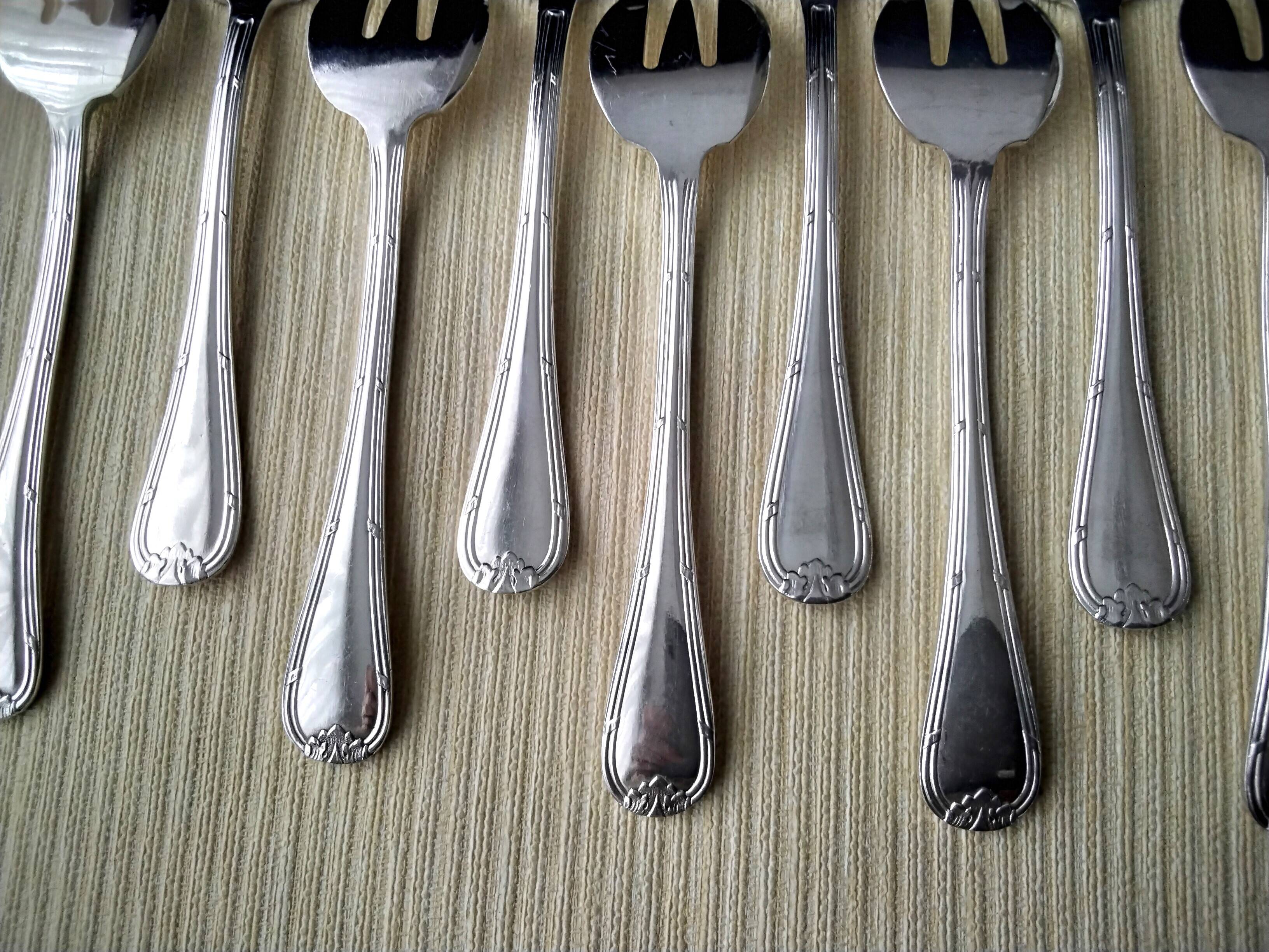Set of 12 silver-plated oyster forks "Crossed Ribbons"