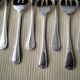 Set of 12 silver-plated oyster forks "Crossed Ribbons"