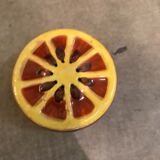 Vintage salt shaker in the shape of an orange marked ermetic