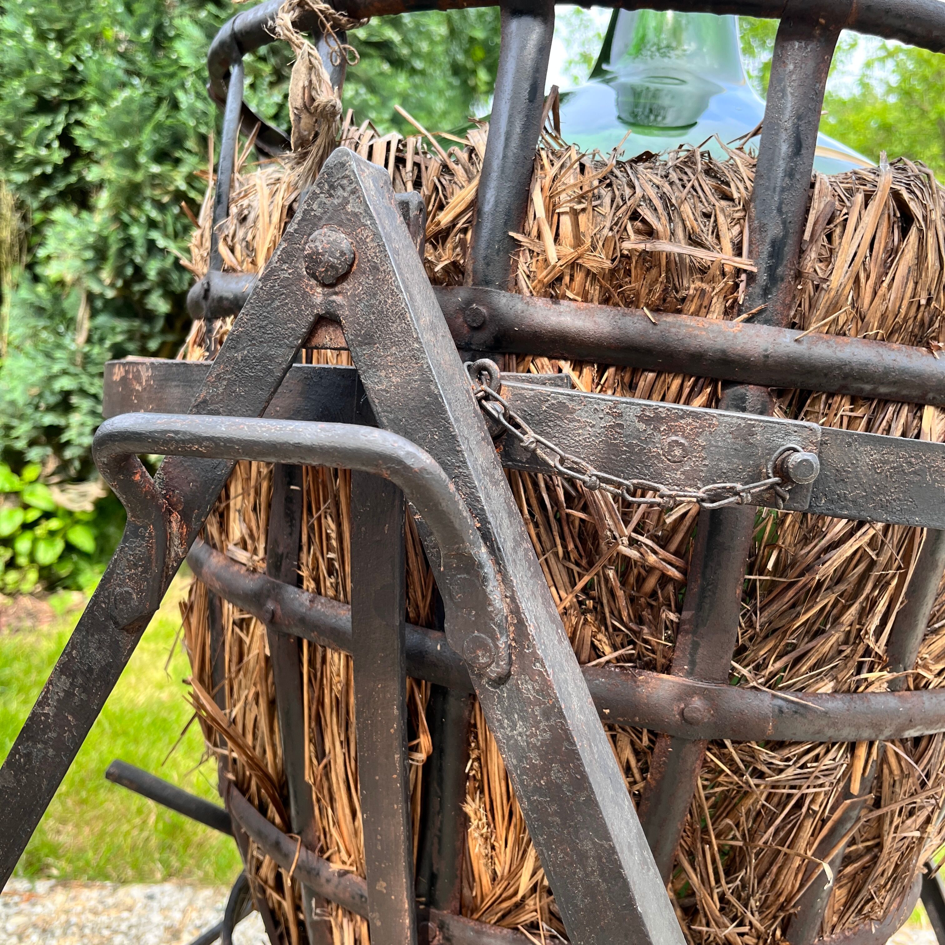 Demijohn on steel rocker