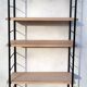 Large String shelf with wooden ladders and metal.