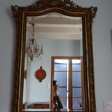 Miroir en bois stuqué doré XIXème siècle 92x142cm