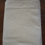 Old sheet in ecru-colored mixed-race canvas
