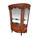 Silver display cabinet with a curved design.