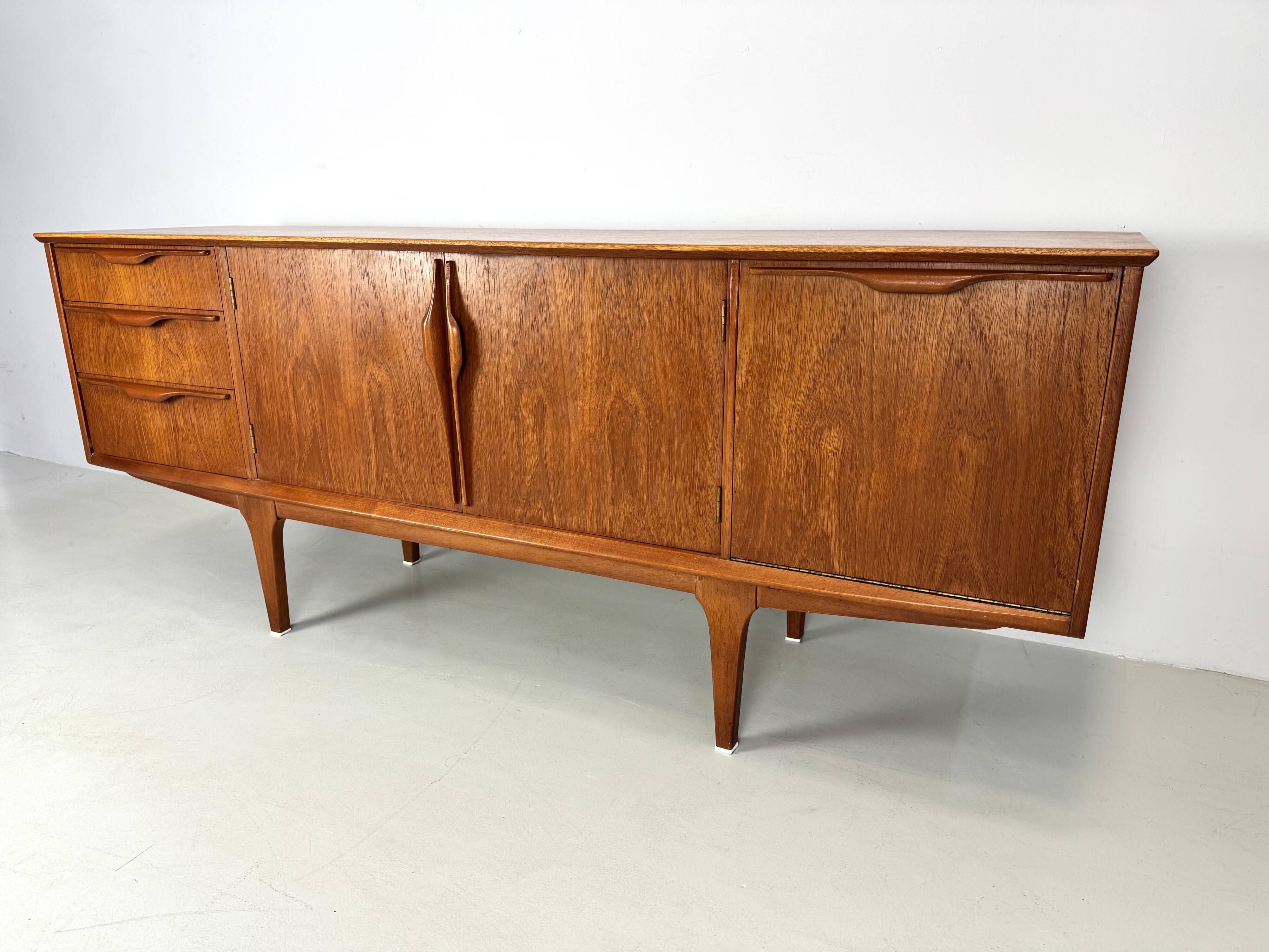Vintage sideboard by Jentique from the 1960s .