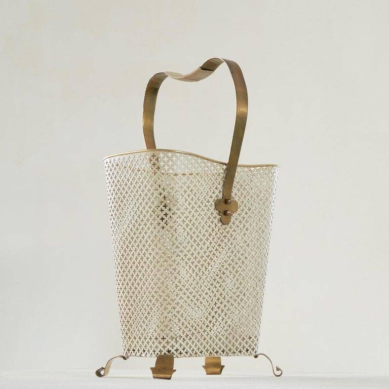 Mid-century umbrella stand in patinated brass and perforated metal, 1950s.