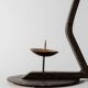 Vintage wrought iron candlestick from the 1960s, zigzag design with removable snuffer.