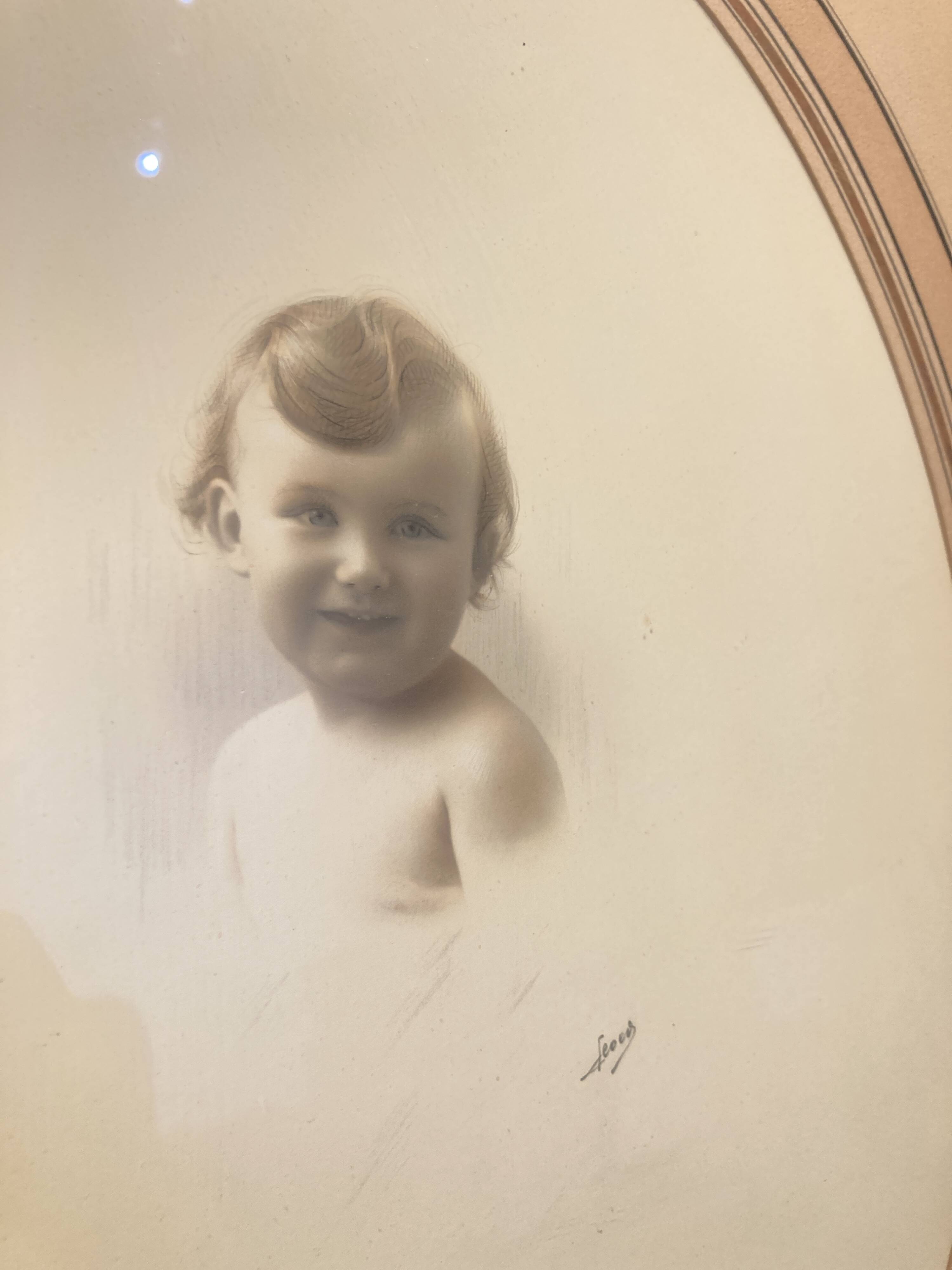 Portrait drawing of a child signed Feoers