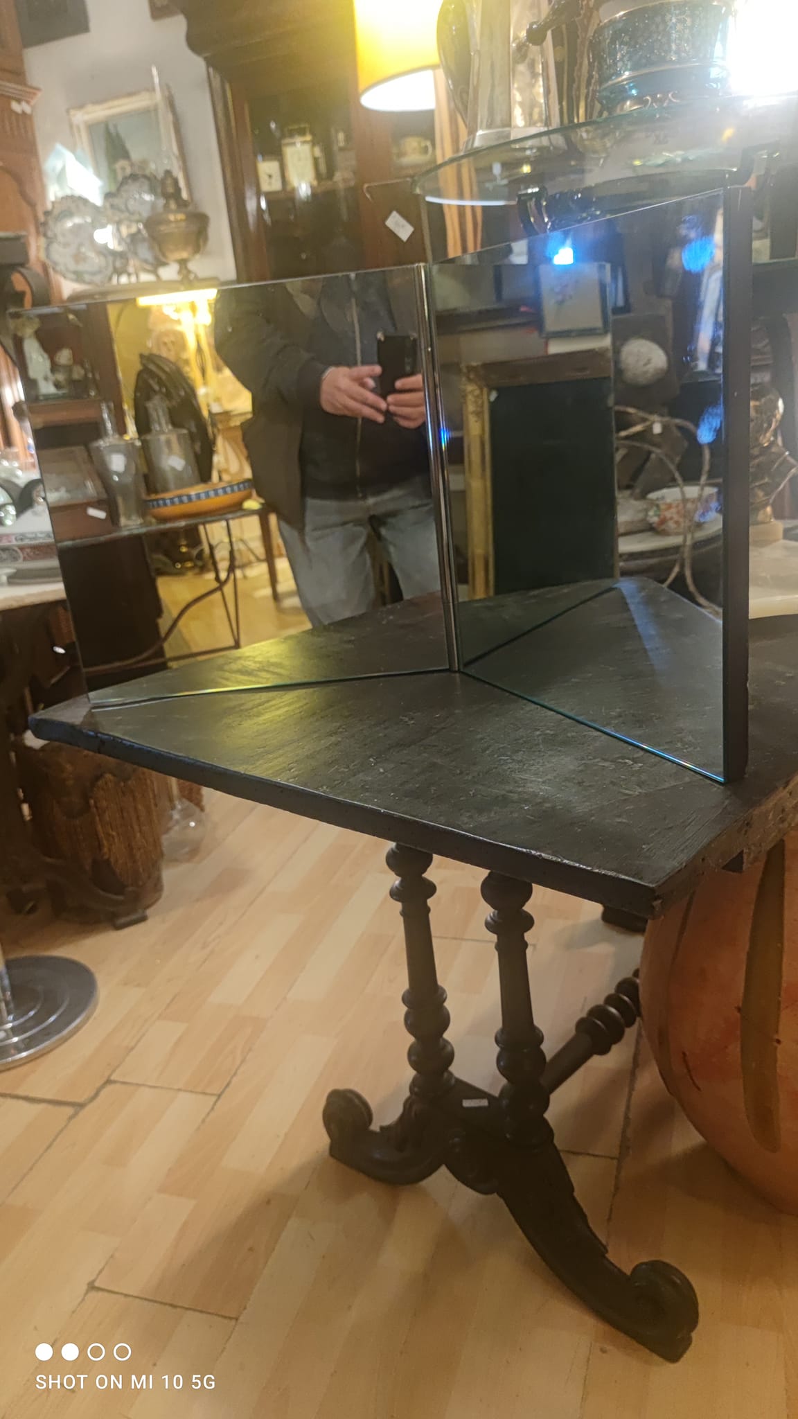 Wall mirror with a wooden frame and Wenge finish, dating from the late 19th century