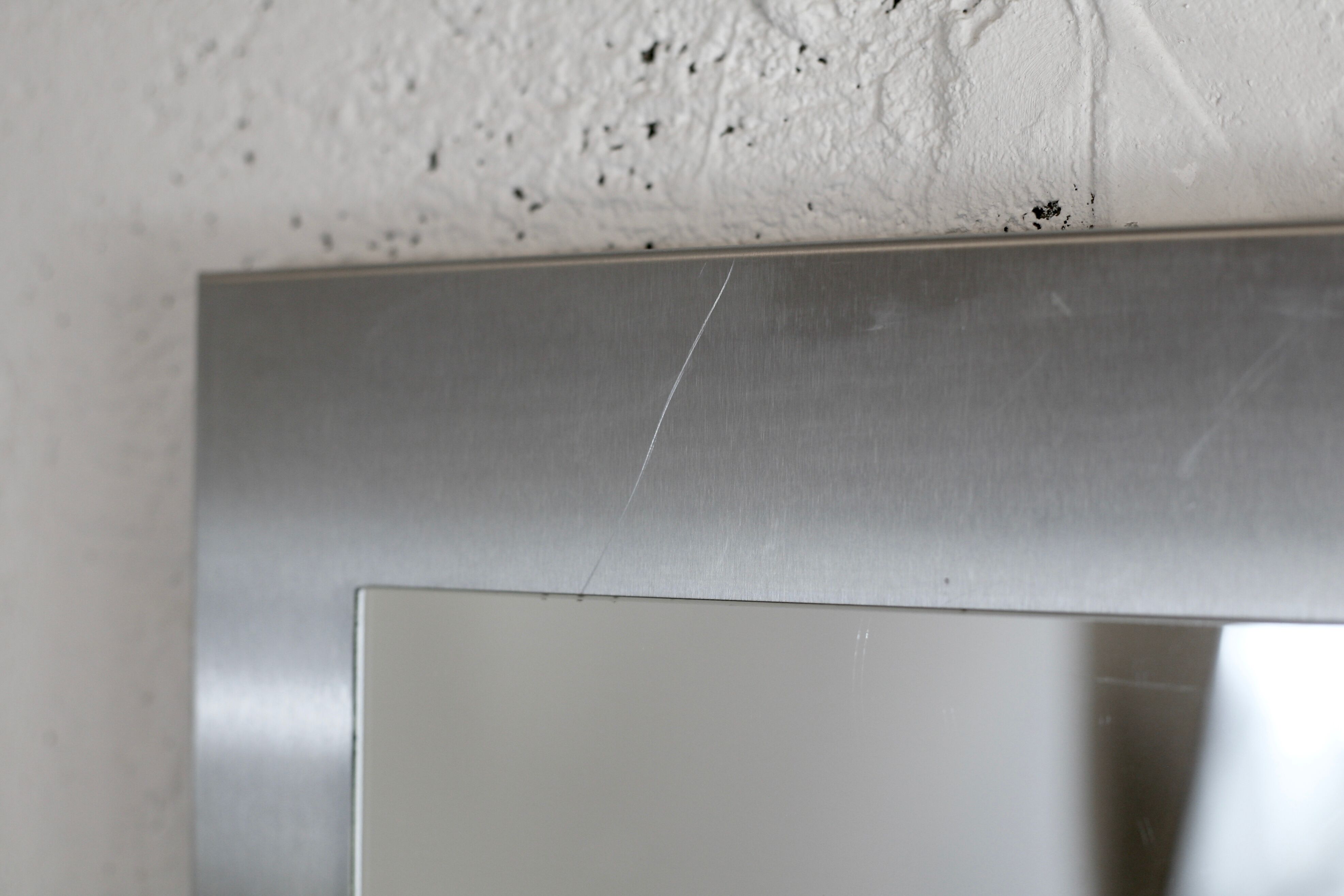 Mirror "space age". Stainless steel. France, circa 1970