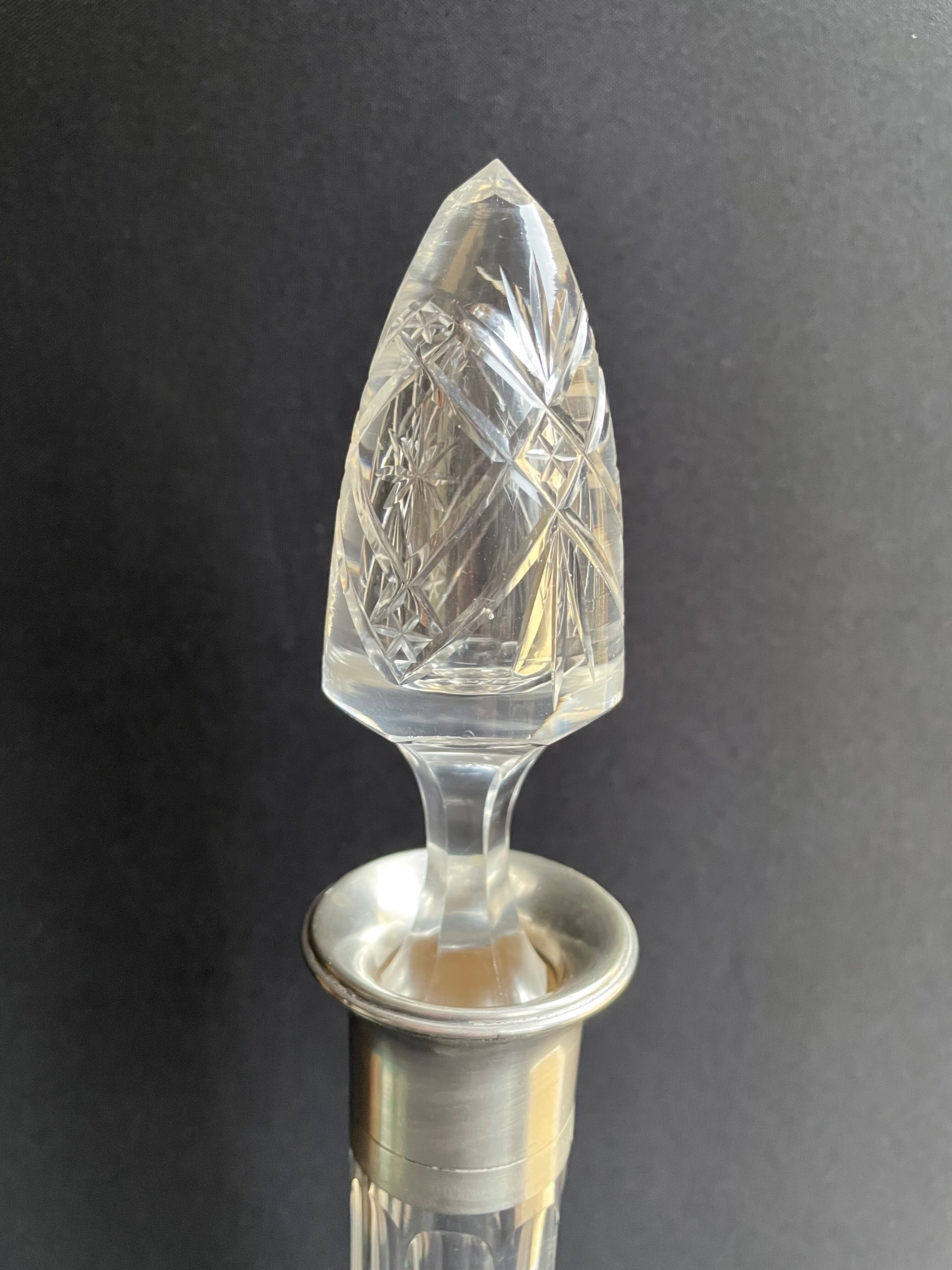 Blown crystal decanter, cut and silver collar