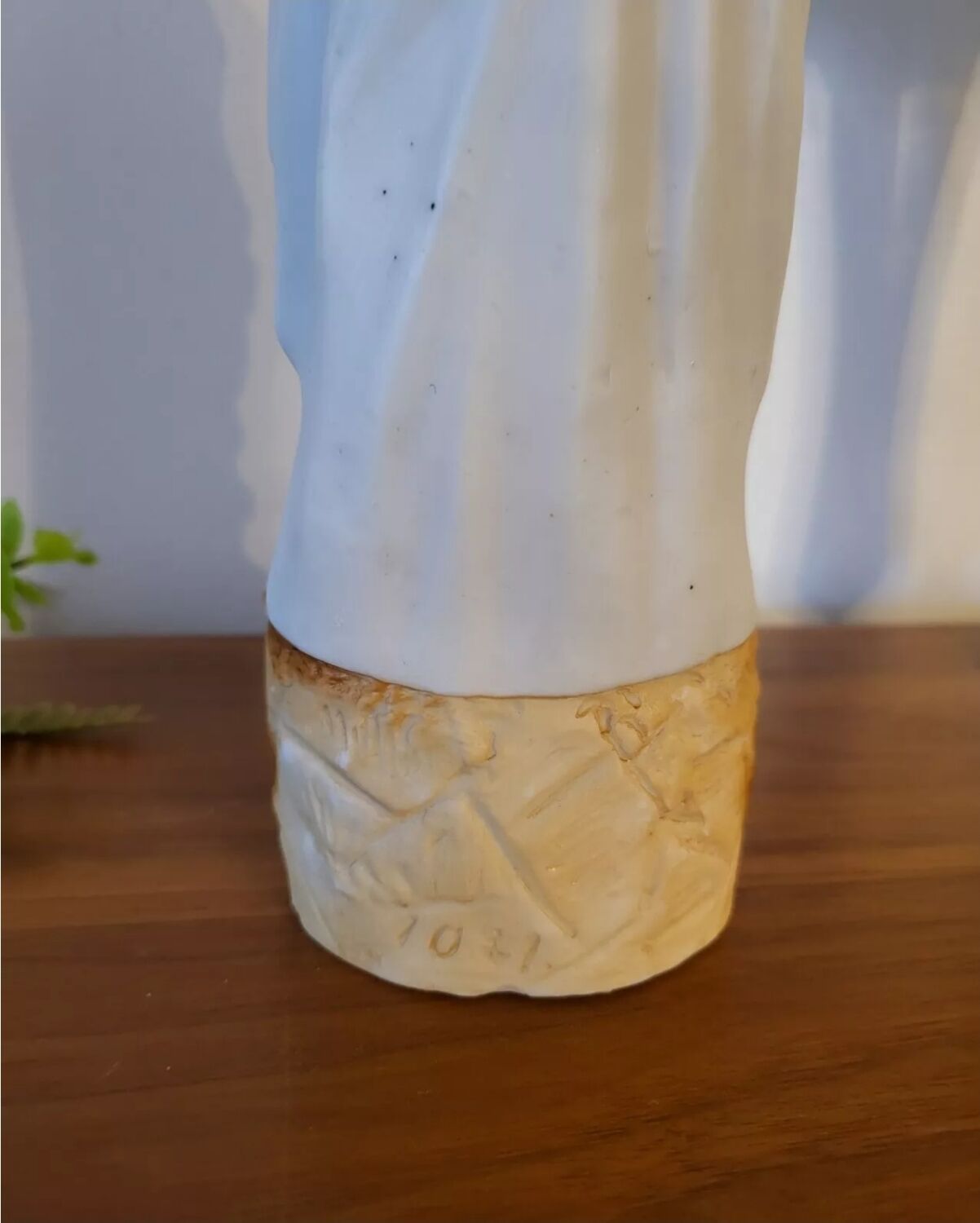 Religious statuette of the Virgin Mary in bisque porcelain